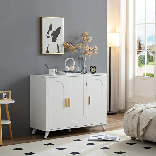 Sideboard cabinet with 3 doors and shelves, white finish, gold handles, legs on gray wall on Tampa Home & Garden Store