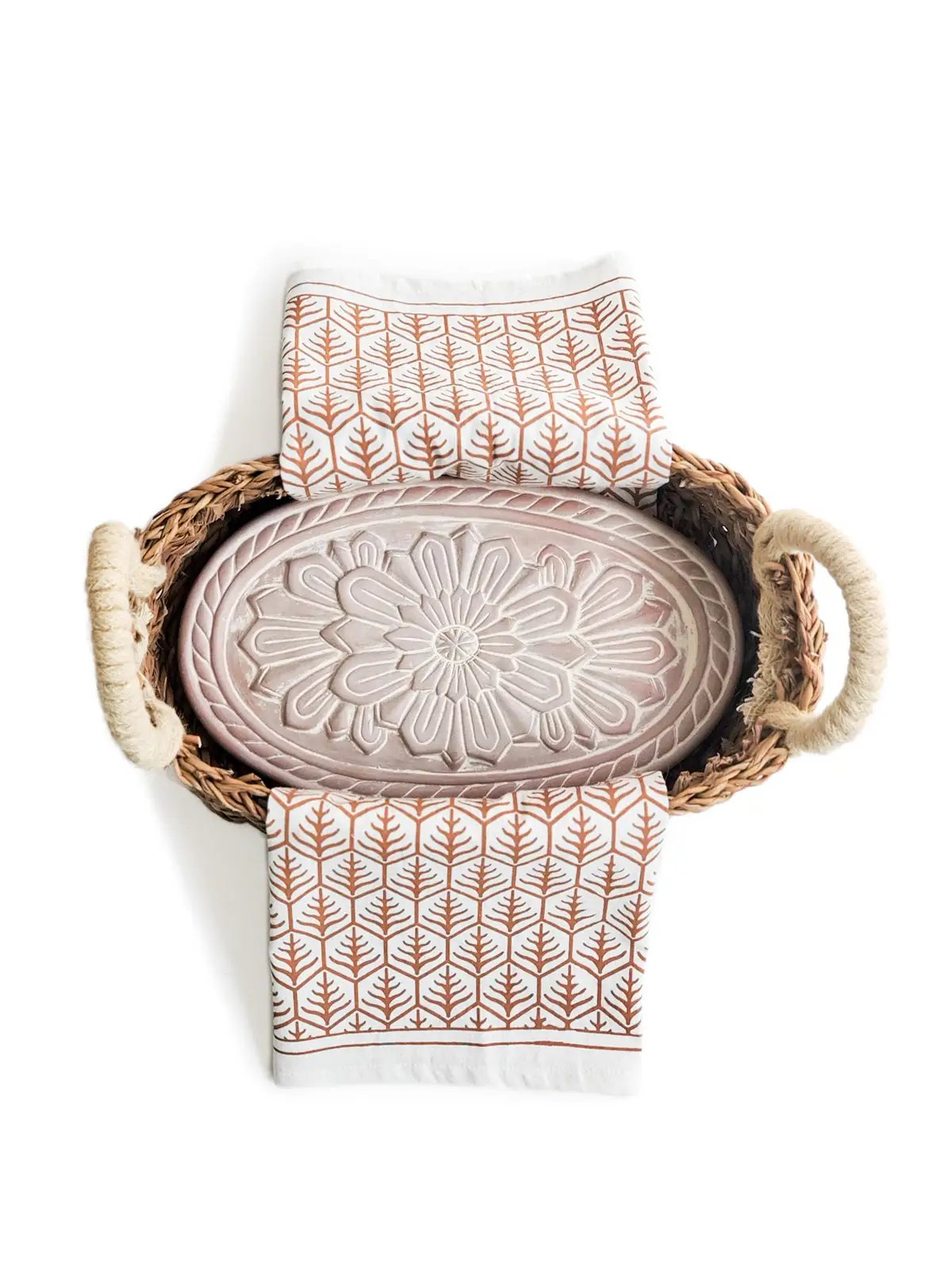 KORISSA bread warmer in pale pink ceramic with embossed floral motif two leaf towels in a basket on Tampa Home & Garden Store