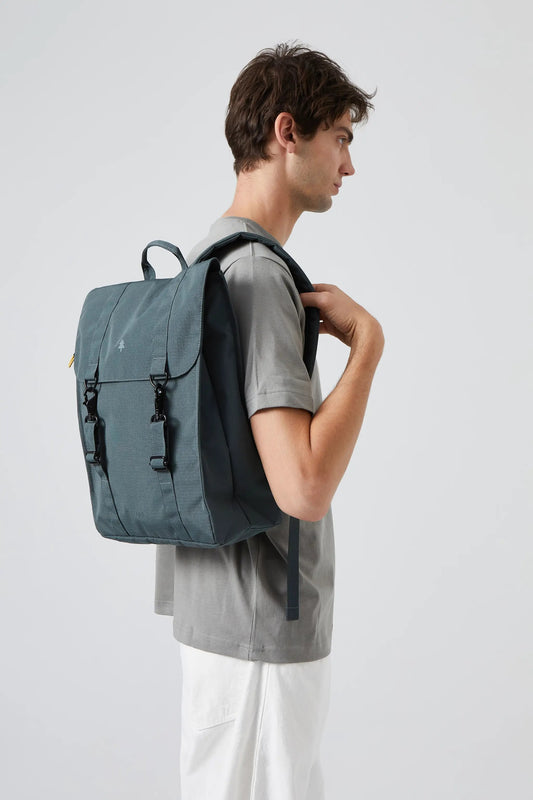 Handy XL Backpack with Laptop Sleeve in blue-gray Lefrik USA worn by man in side profile on Tampa Home & Garden Store