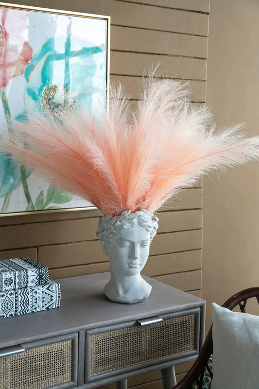 Greek style cement head planter by Unique Piece Furniture in gray with pink pampas grass on Tampa Home & Garden Store