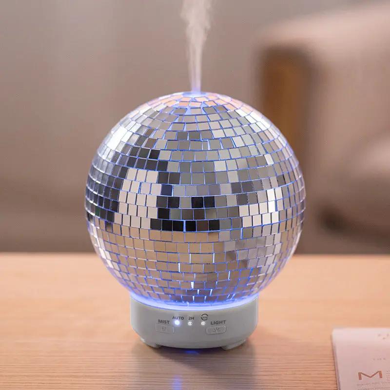 Rotating disco ball humidifier with blue LED glow for aromatherapy on Tampa Home & Garden Store