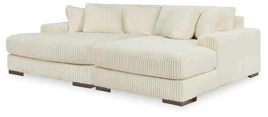 Lindyn Sectional by Unique Piece Furniture in cream ribbed corduroy with plush cushions on Tampa Home & Garden Store