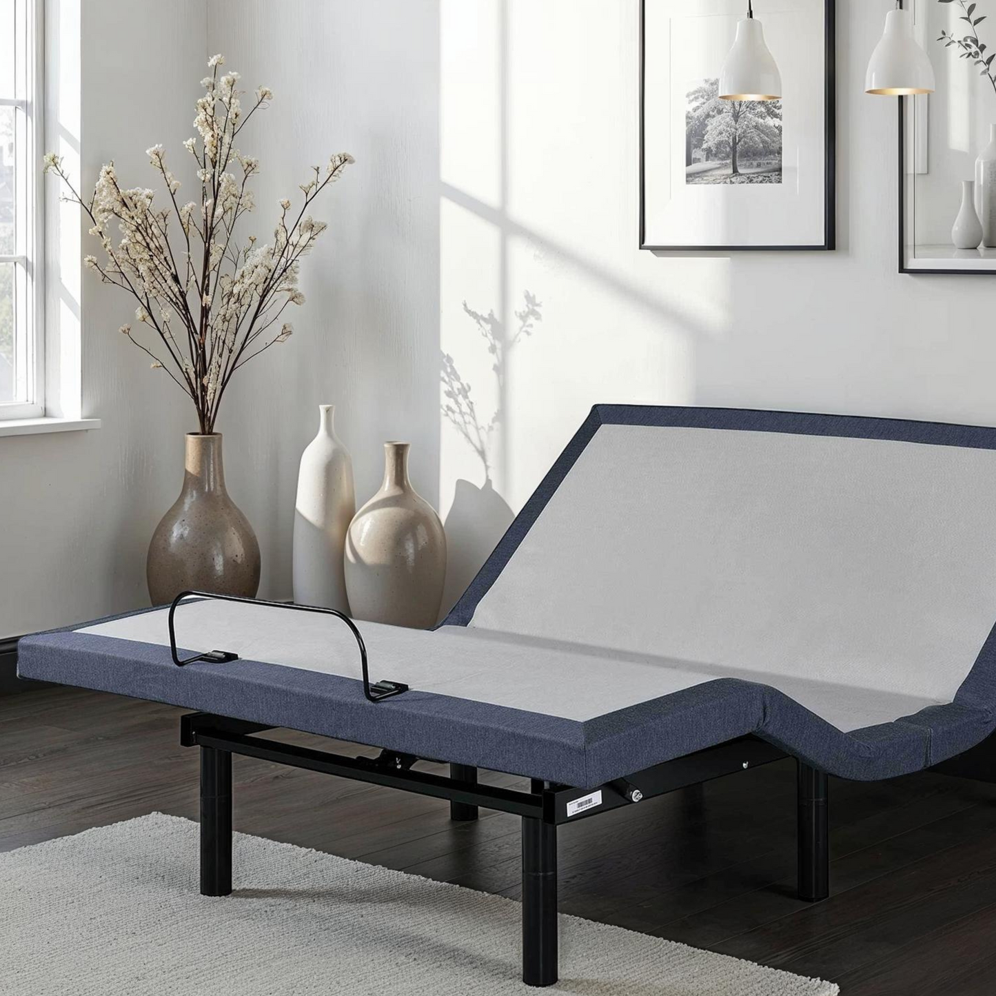 Queen adjustable bed base with dark blue-gray upholstery and black metal legs, vibration modes on Tampa Home & Garden Store