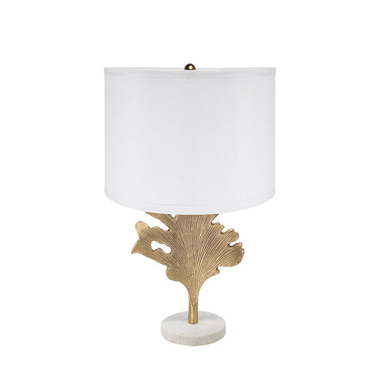 D13x22.2in Table Lamp by HouseOfZazla with white drum shade and gold leaf base on marble pedestal on Tampa Home & Garden Store