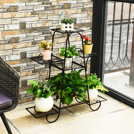 7 Tier Metal Patio Plant Stand with black frame and curved legs holding potted plants on Tampa Home & Garden Store