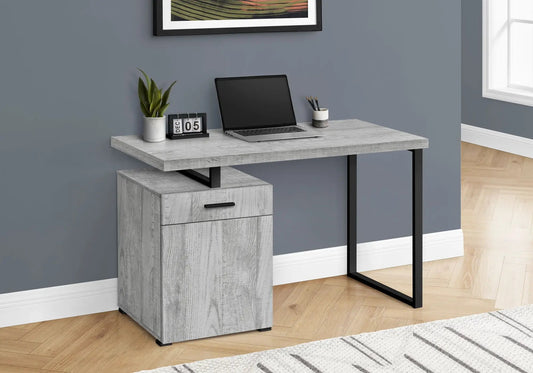 Computer desk in light gray wood finish with left-side storage drawers and black metal legs on Tampa Home & Garden Store