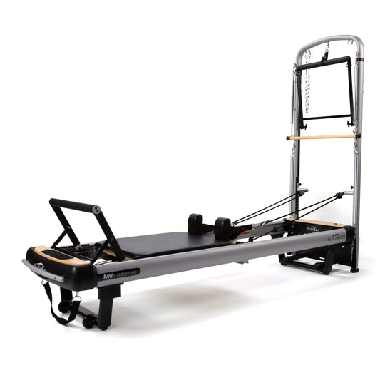 MVe Reformer with Tower attachment Peak Pilates; silver frame, black padding on Tampa Home & Garden Store