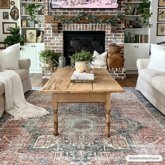 Rosman Distressed Washable Area Rug by Boutique Rugs in pink and blue distressed pattern on Tampa Home & Garden Store