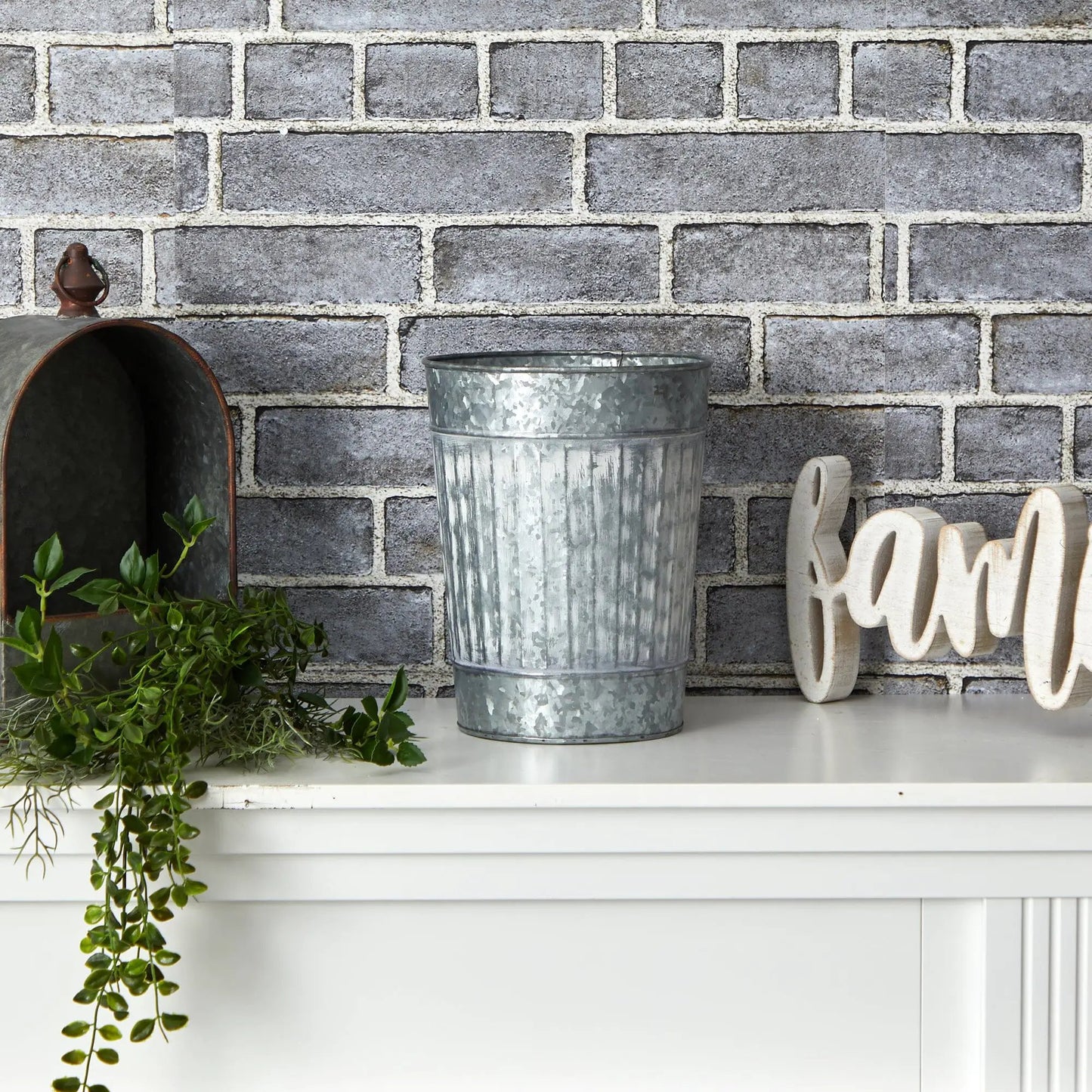 10 Inch Farmhouse Country Pail Planter in galvanized metal finish on a brick backdrop on Tampa Home & Garden Store