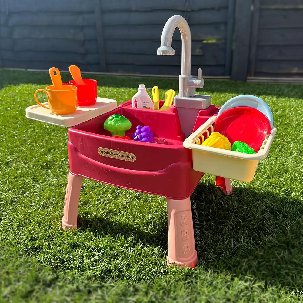Moktan Sabai Kids Kitchen Sink Toy Set with Water Circulation, red sink, pink legs, beige trays on Tampa Home & Garden Store