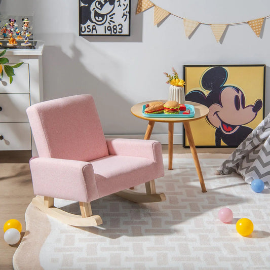 Kids Rocking Chair with Solid Wood Legs in pink fabric, curved rockers in a playful setting on Tampa Home & Garden Store