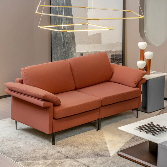Coral fabric loveseat sofa with slim black metal legs and matching back pillows on Tampa Home & Garden Store