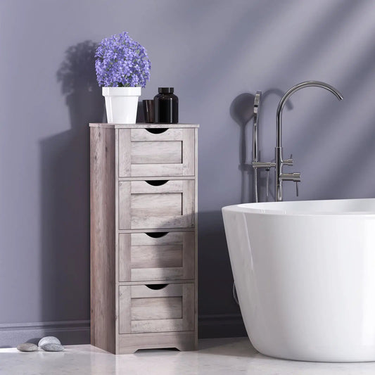 Grey four-drawer wooden floor cabinet beside a freestanding tub with purple flowers on top on Tampa Home & Garden Store