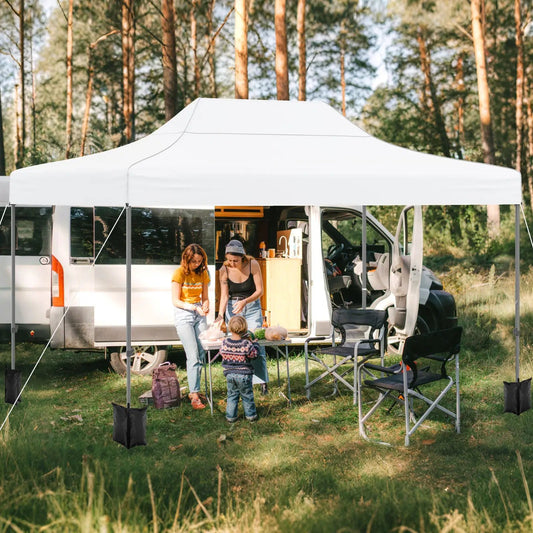 Pop up canopy tent 10x14 ft white outdoor shade shelter with metal frame at campsite on Tampa Home & Garden Store