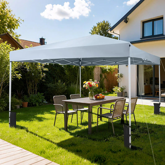 10x10 Pop Up Canopy by DirectDeals white with carry bag and 4 sandbags in backyard on Tampa Home & Garden Store