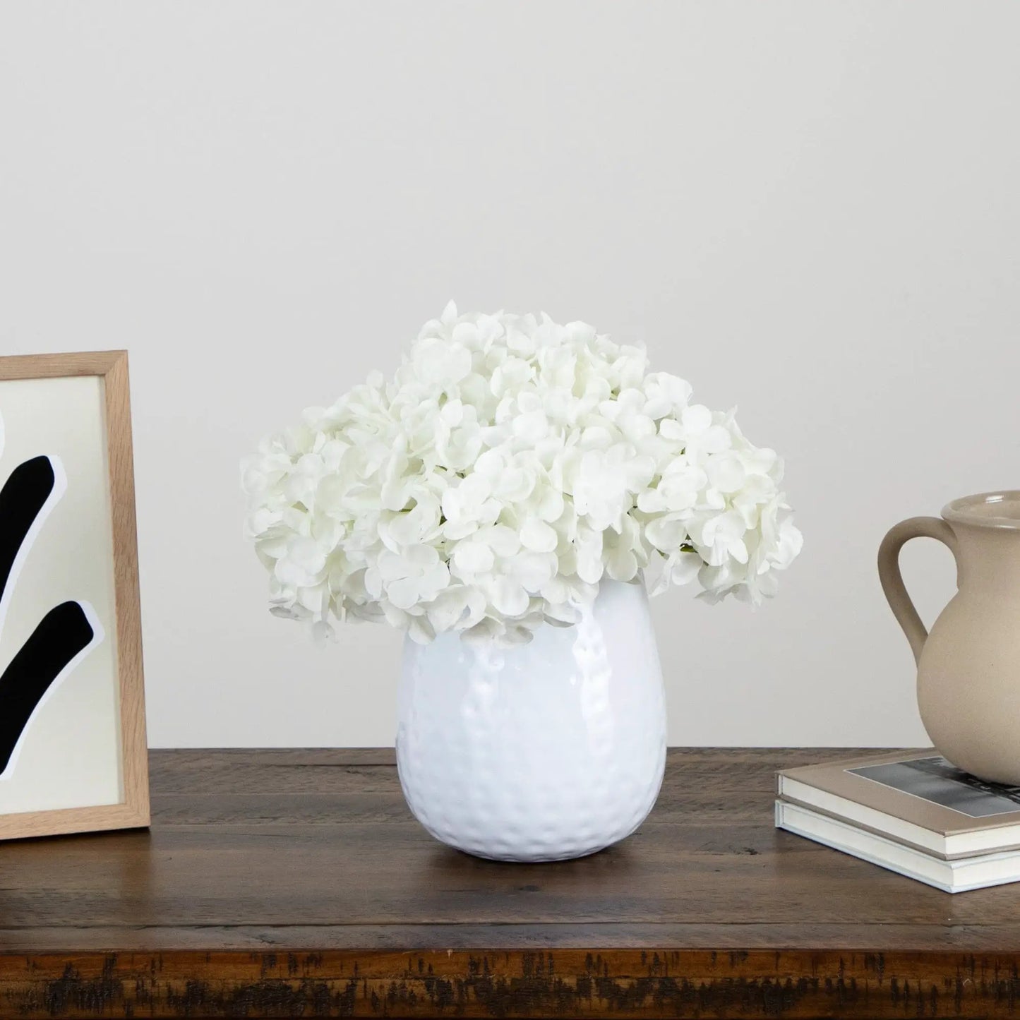 11-inch artificial hydrangea arrangement in a white vase on a wooden surface on Tampa Home & Garden Store