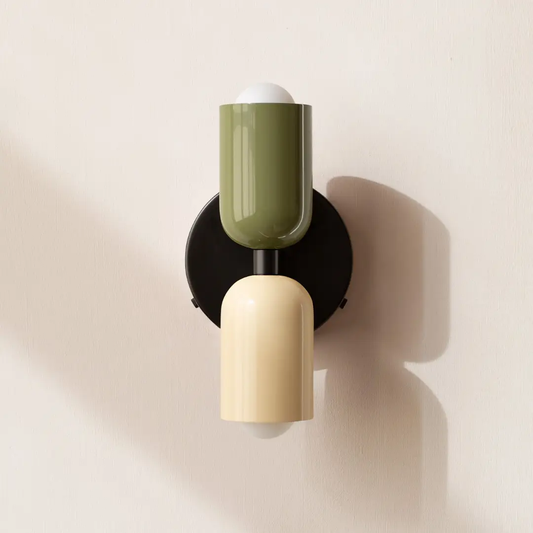 Modern Minimalist Cylinder LED Wall Sconce olive green and cream cylinders with black backplate on Tampa Home & Garden Store