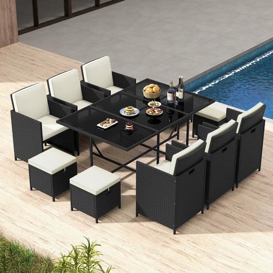 11-piece DirectDeals outdoor dining set with glass-top tempered table, black wicker and cream cushions on Tampa Home & Garden Store