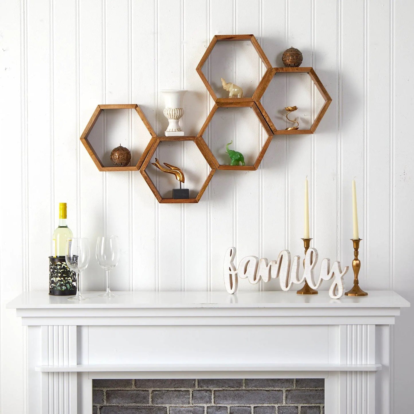 Wooden hexagon honeycomb wall shelves set of five in natural wood finish on white beadboard wall on Tampa Home & Garden Store