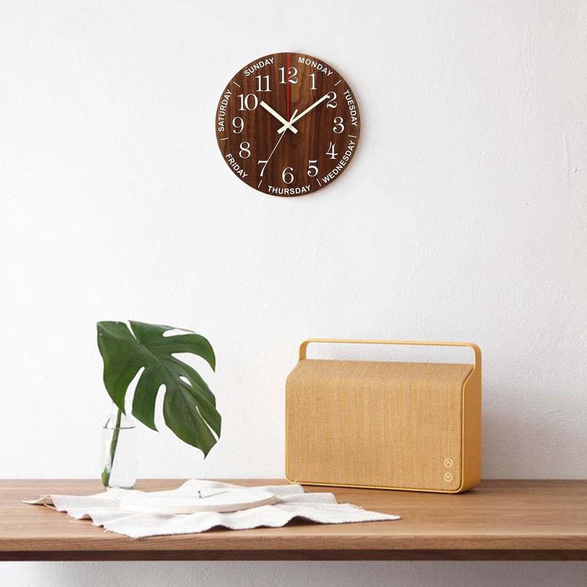 12-Inch Luminous Wood Wall Clock with night light and silent movement on wall beside radio on Tampa Home & Garden Store