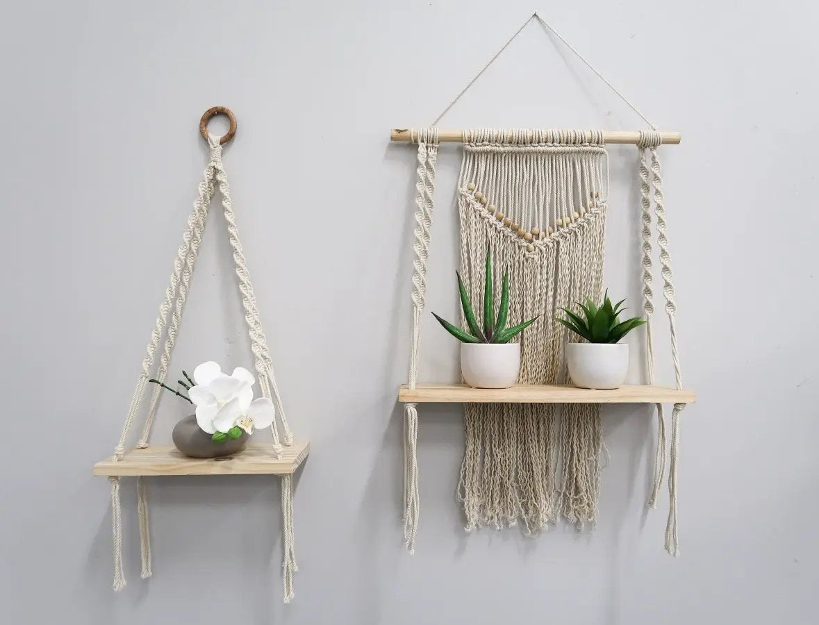 Macrame wall hanging with a wooden plant shelf and two pots plus hanging planter on Tampa Home & Garden Store