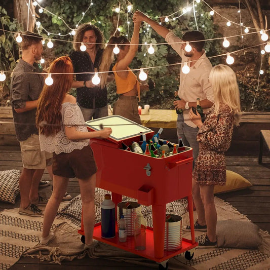 Red 80-quart outdoor rolling steel cooler cart with bottle storage at a backyard party on Tampa Home & Garden Store