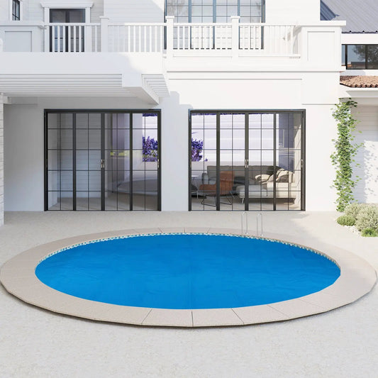 12ft round above-ground pool with blue water in a modern white backyard with glass doors on Tampa Home & Garden Store