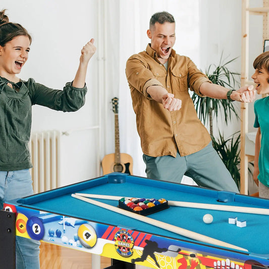 12-in-1 combo game table with foosball blue top and billiard balls in a living room on Tampa Home & Garden Store