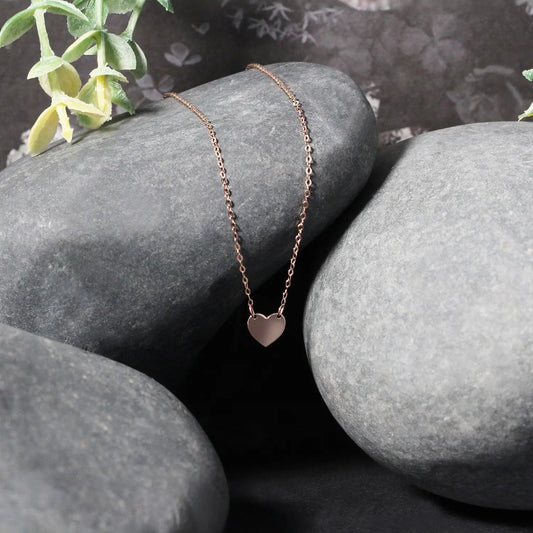 14K rose gold delicate mini heart necklace with slim chain and heart pendant by Bids on Tampa Home & Garden Store
