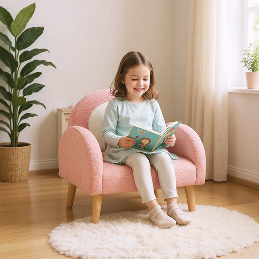 Kids pink armchair with comfy backrest and wooden legs, child reading on Tampa Home & Garden Store