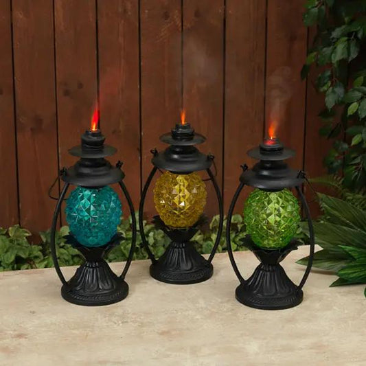 14-inch lighted metal and glass lanterns set of 3 in blue, yellow and green with black frames on Tampa Home & Garden Store