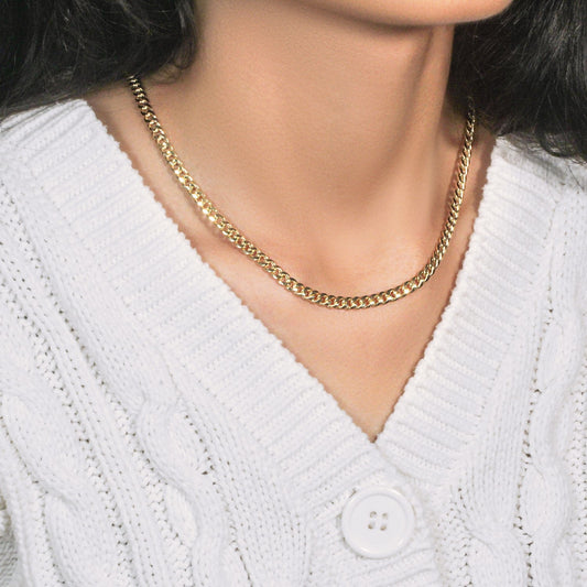 10k yellow gold Miami Cuban chain necklace 4.50 mm by Bids.com worn on model on Tampa Home & Garden Store