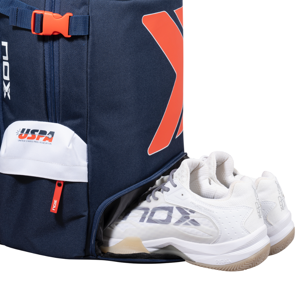 NOX Padel Backpack navy bag with orange buckle and white shoe pocket on Tampa Home & Garden Store