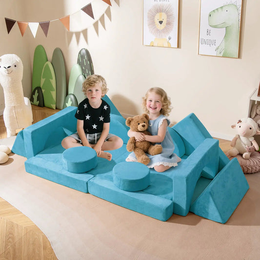 14-piece modular kids play couch in teal blue with ottomans; kids teddy bear in playroom on Tampa Home & Garden Store