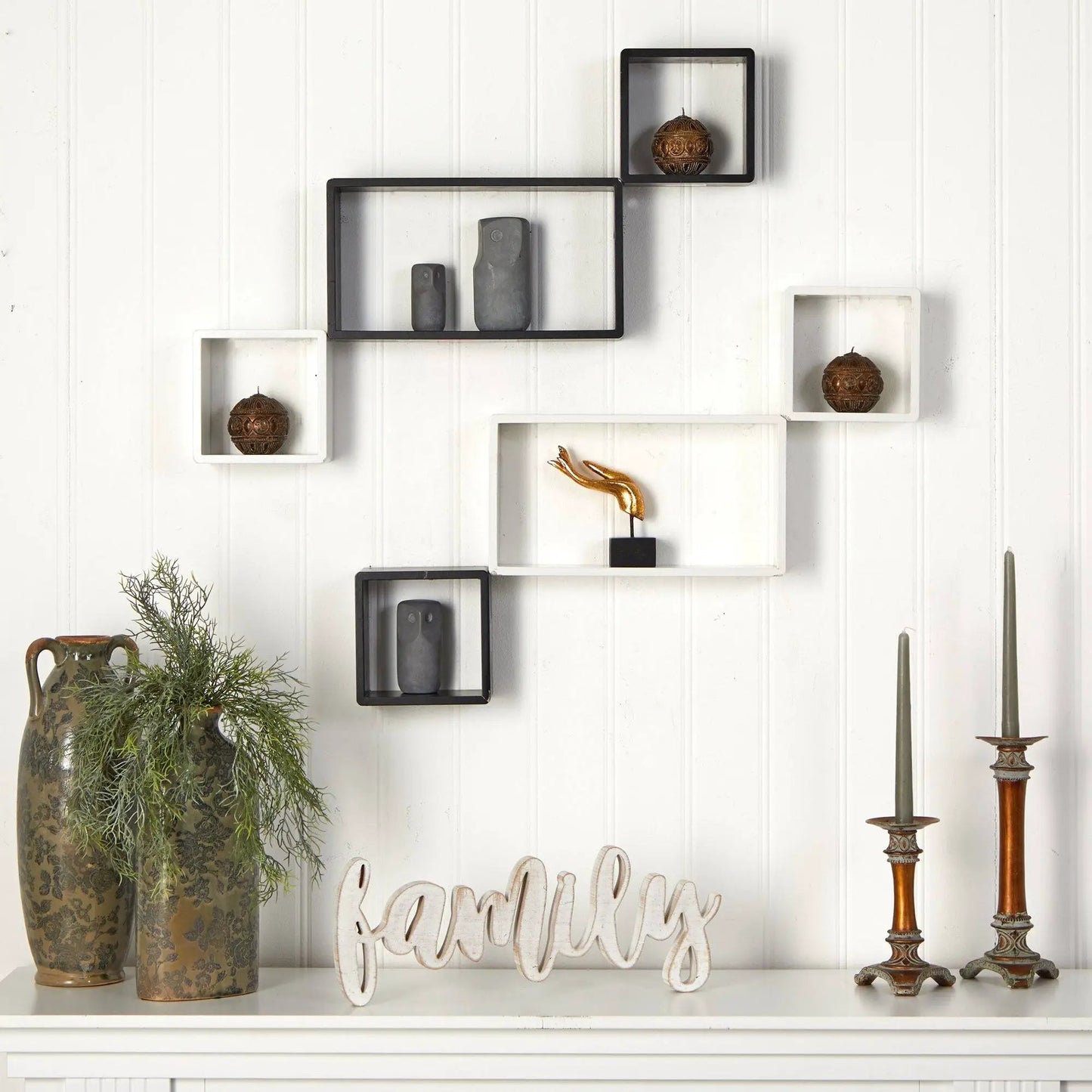 Set of six 15-inch modern floating wall shelves in black and white frames mounted on a white paneled wall on Tampa Home & Garden Store