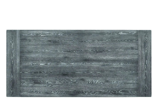 Leventis dining table weathered gray wood grain with chunky end legs on Tampa Home & Garden Store