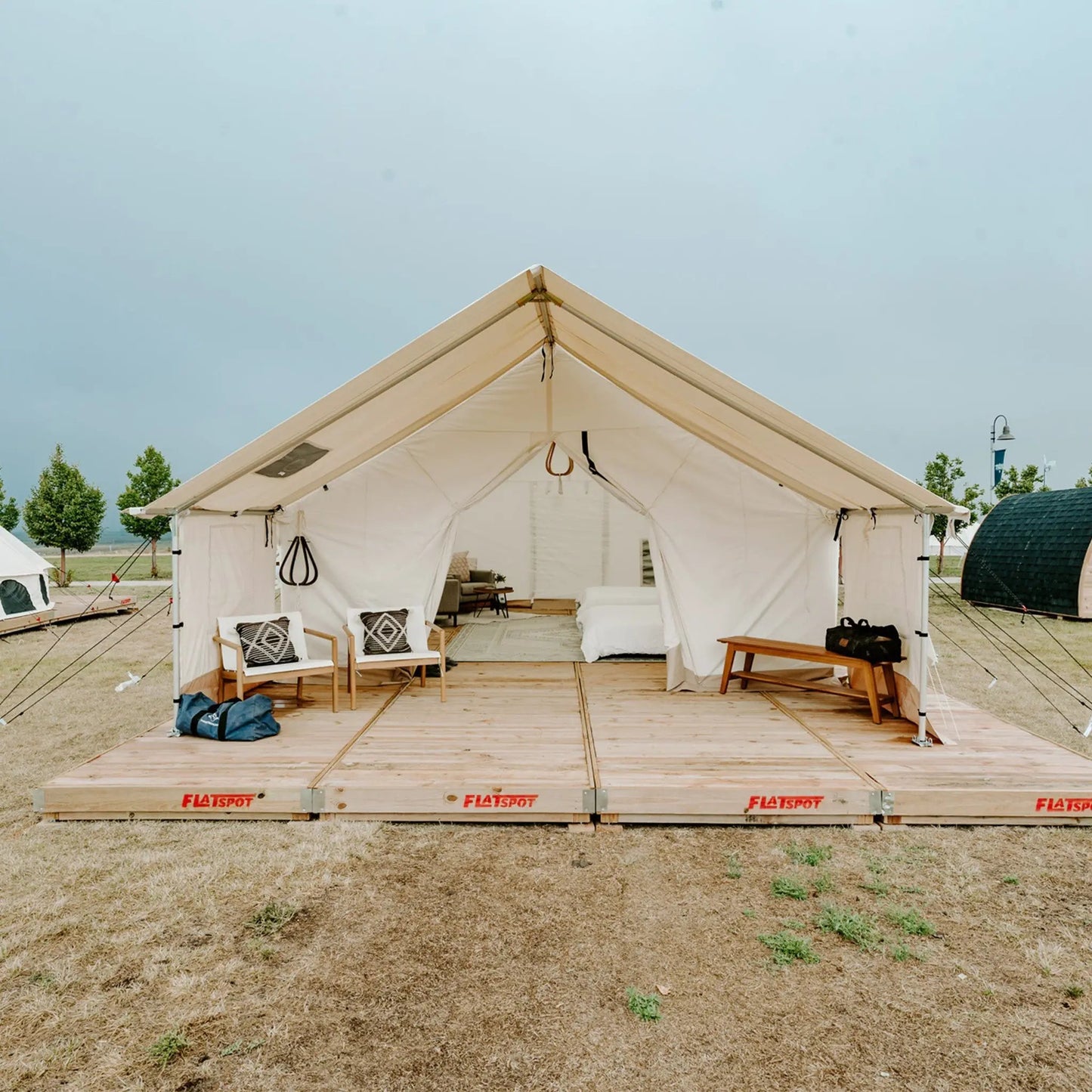 Alpha Pro Wall Tent 16x24 beige canvas with furnished interior lounge by White Duck Outdoors on Tampa Home & Garden Store