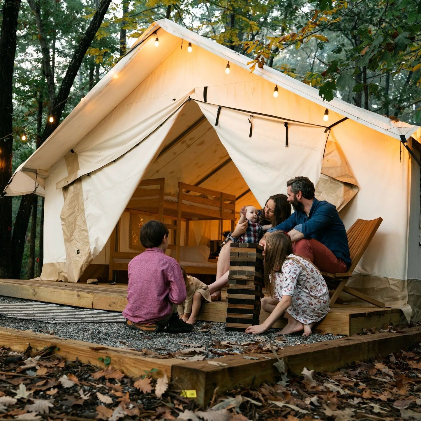 Alpha Wall Tent 16x24 canvas tent by White Duck Outdoors with warm string lights on Tampa Home & Garden Store