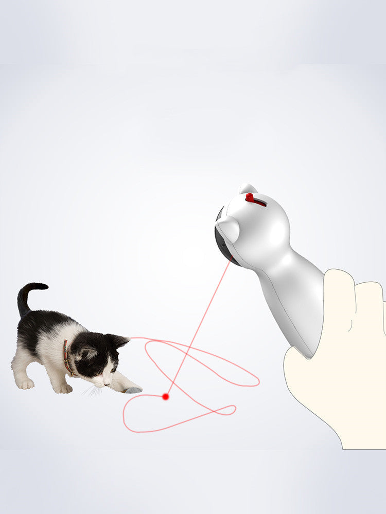 Sell My Stuff automatic cat toy white robotic device with LED laser; kitten and toy nearby on Tampa Home & Garden Store