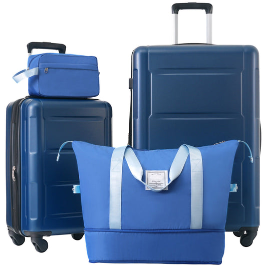 Blue luggage set with suitcases and bags, tote and 20in/28in spinners on Tampa Home & Garden Store on Tampa Home & Garden Store