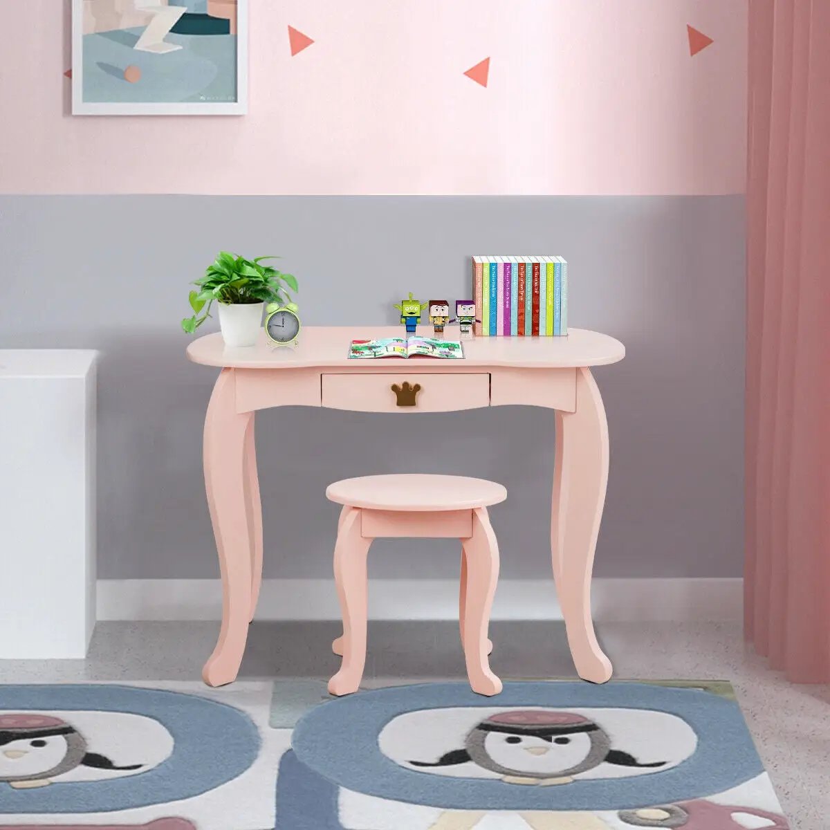 Kids makeup vanity table with pink finish and curved legs, matching stool, books on top on Tampa Home & Garden Store