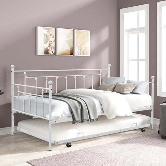 Metal twin daybed with trundle in light grey, spindle rail design and white bedding on Tampa Home & Garden Store