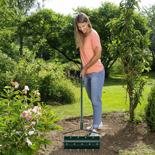DirectDeals 18/21 inch manual lawn aerator with detachable handle and green roller in use on Tampa Home & Garden Store