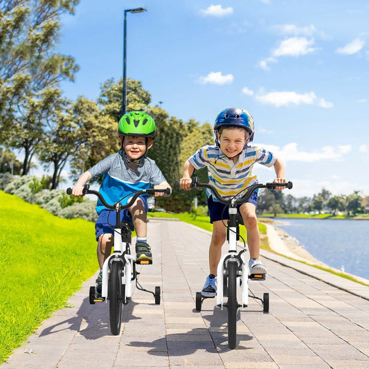 18 Feet Kids Bike With Training Wheels DirectDeals two kids ride lakeside path wearing helmets on Tampa Home & Garden Store