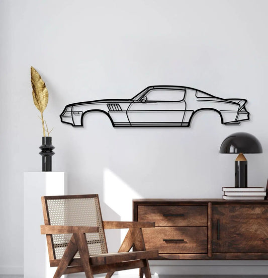 1978 Camaro Z28 metal wall art in black line art above a wooden sideboard on Tampa Home & Garden Store
