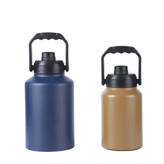 Double Wall Half Gallon Insulated Water Bottle set in navy blue and tan with black caps on Tampa Home & Garden Store