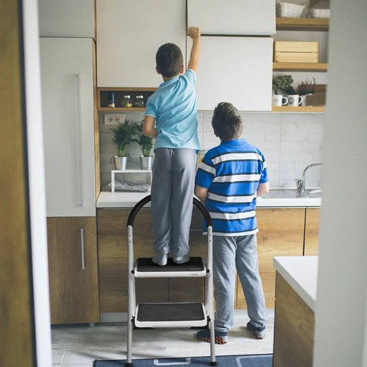 DirectDeals folding step stool 2.75 ft with iron frame gray steps two kids on it in kitchen on Tampa Home & Garden Store