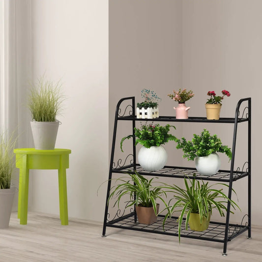 Three-Tier Metal Plant Stand with a black frame holding seven potted plants on Tampa Home & Garden Store