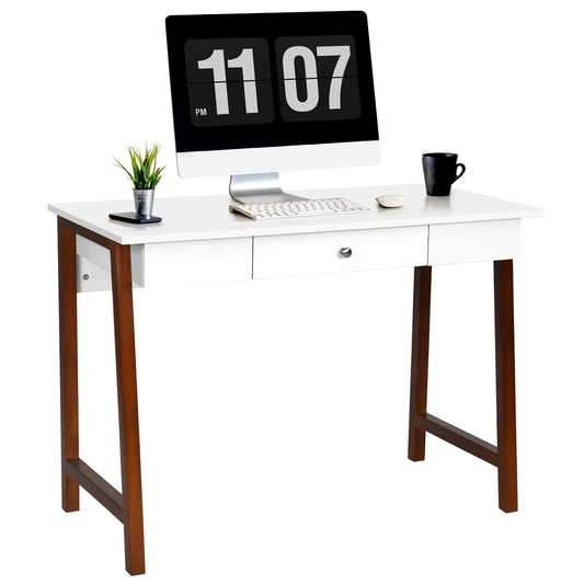 White computer desk with 2 drawers and brown legs, desk holds all-in-one computer and plant on Tampa Home & Garden Store