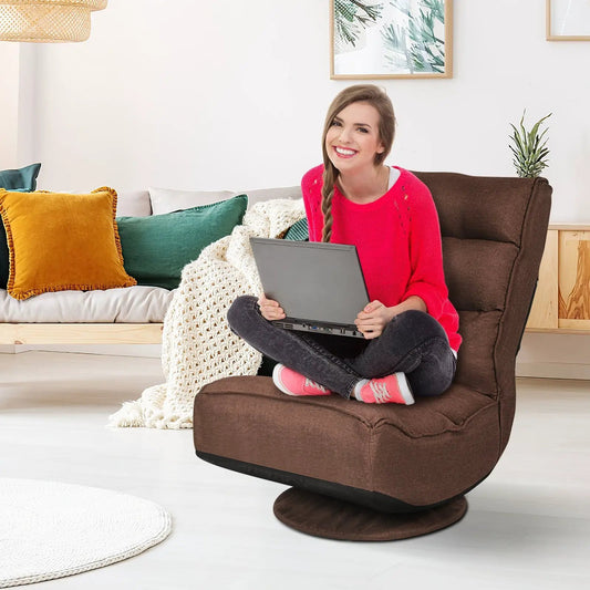 5-Position folding floor gaming chair in brown fabric with round base, user with laptop on Tampa Home & Garden Store